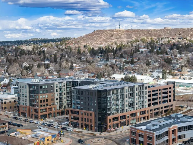a view of city with tall buildings