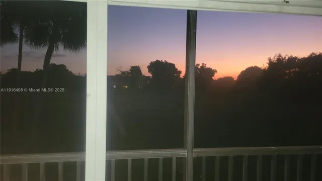 a view of a cars parked in front of a building