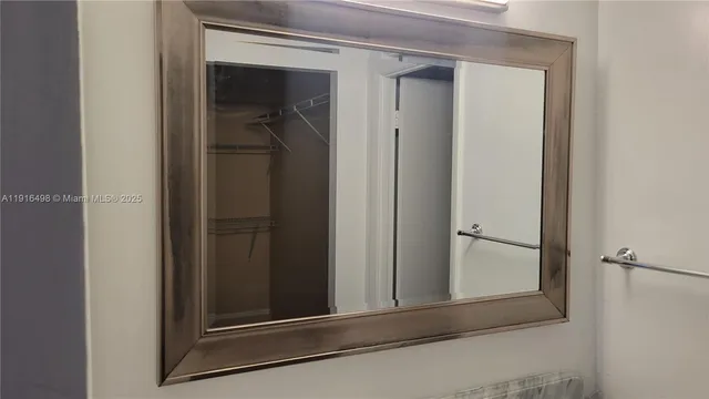 a bathroom with a glass door