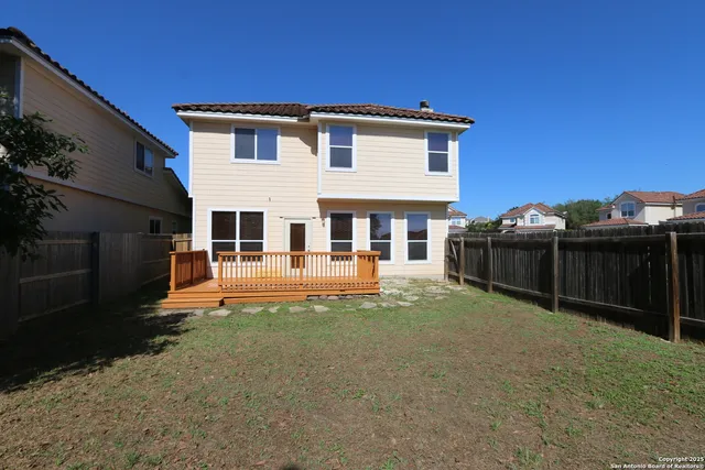 a front view of a house with yard