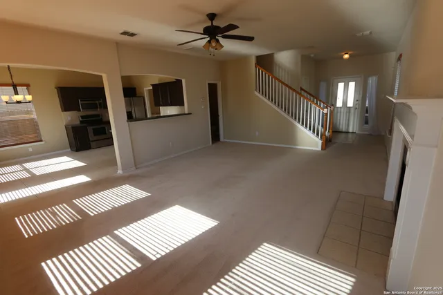 a view of a hallway with a couch