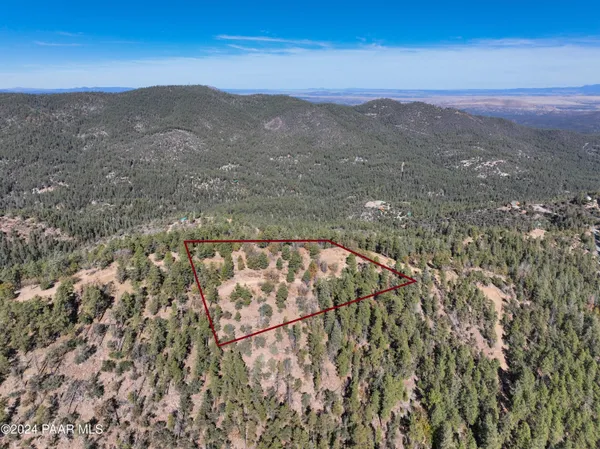 a view of a city with mountains