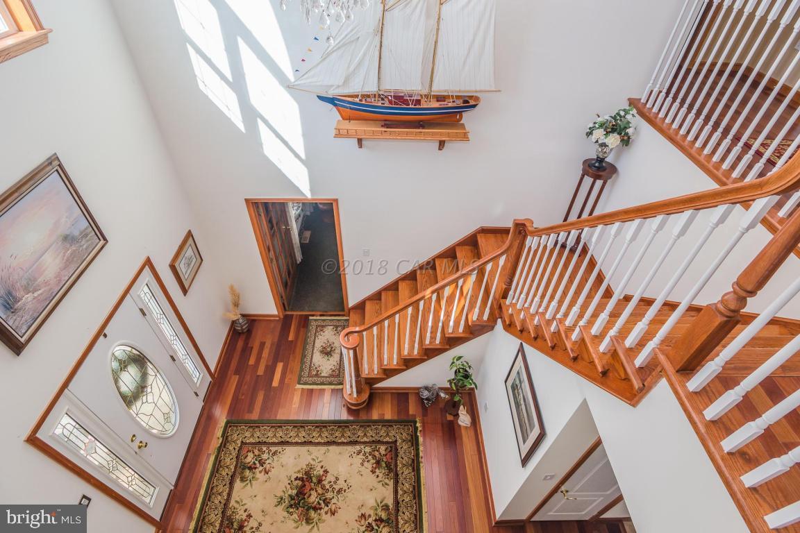 5115 Thomas Long Road Crisfield, MD 21817 - Photo 8 of 44 Stunning Staircase Foyer Entrance