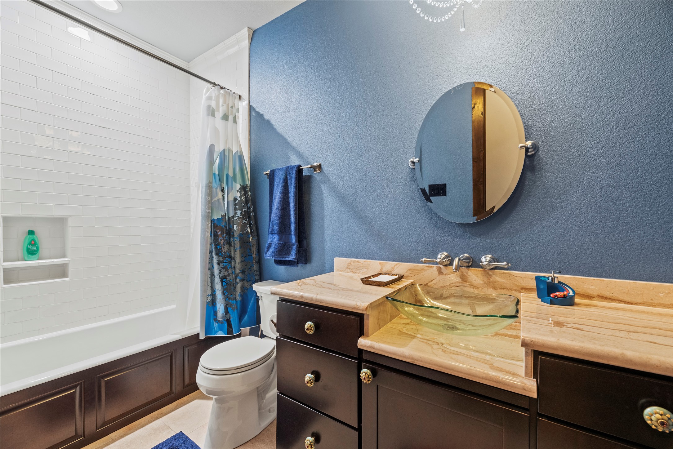 7715 Firethorne Creek Court Spring, TX 77389 - Photo 32 of 50 a bathroom with a granite countertop sink and a mirror