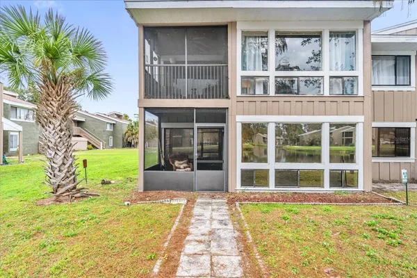 a view of swimming pool with a yard