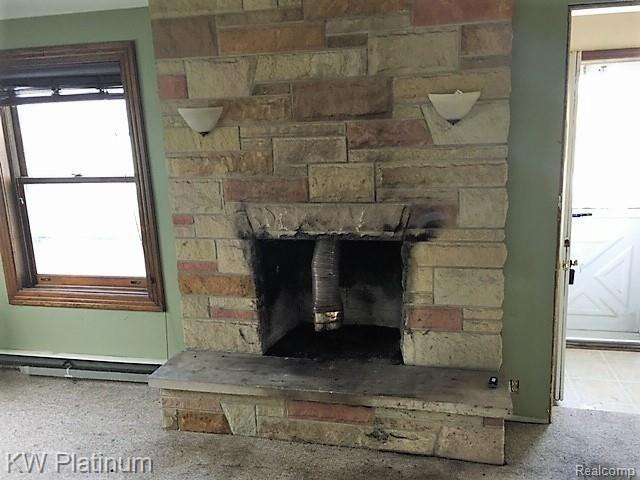 5209 McIntyre Road North Street, MI 48049 - Photo 6 of 26 fireplace.jpg