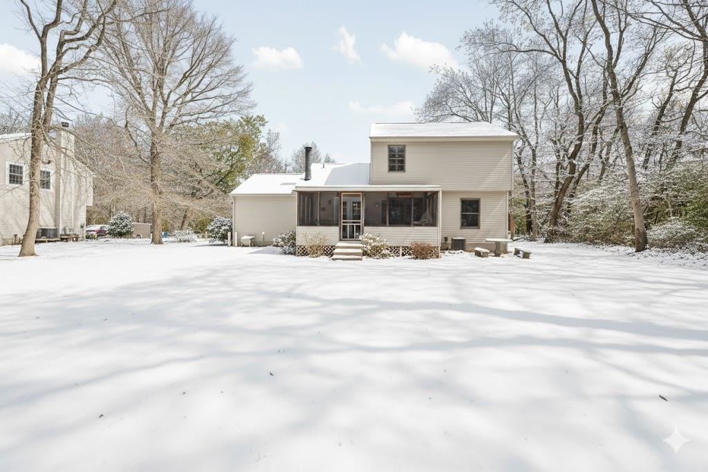 510 Portsmouth Road Cape May, NJ 08204 - Photo 14 of 18 a view of the house with a yard covered in snow