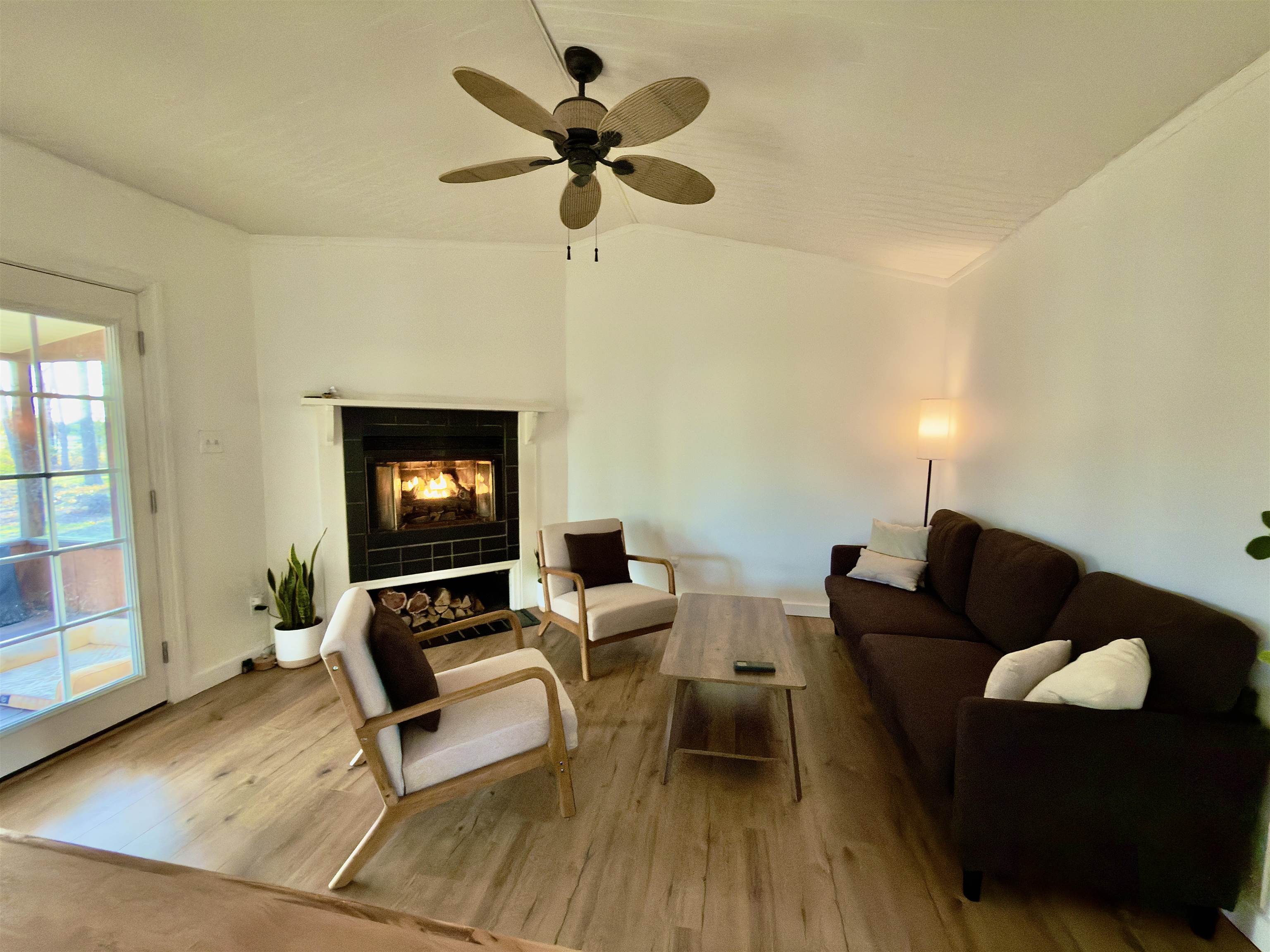 510 Portsmouth Road Cape May, NJ 08204 - Photo 37 of 41 a living room with furniture and a fireplace
