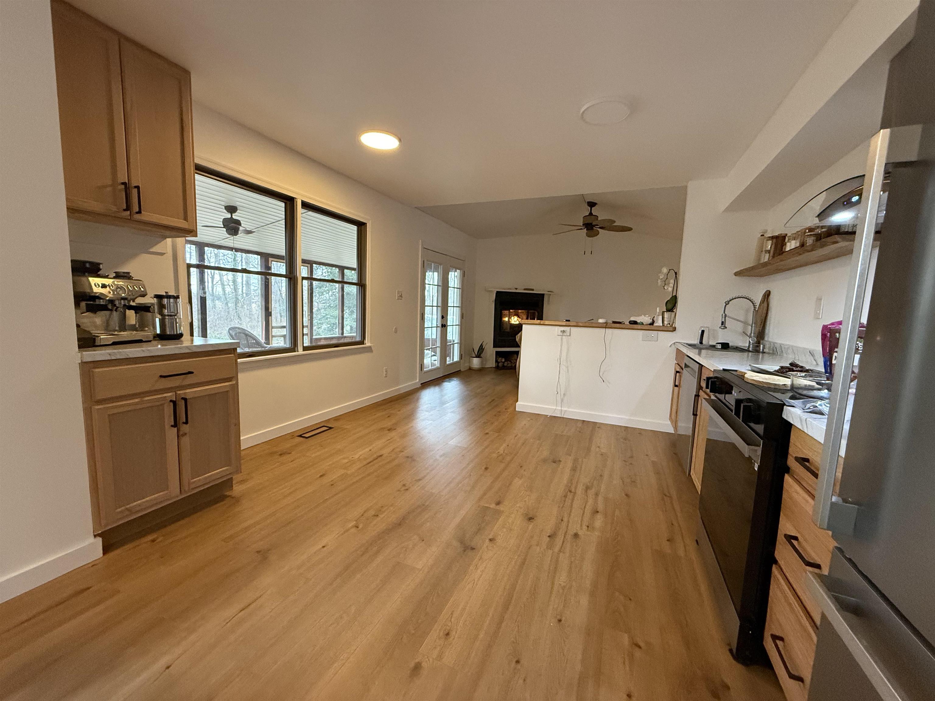 510 Portsmouth Road Cape May, NJ 08204 - Photo 4 of 41 a room with wooden floors and wooden cabinets