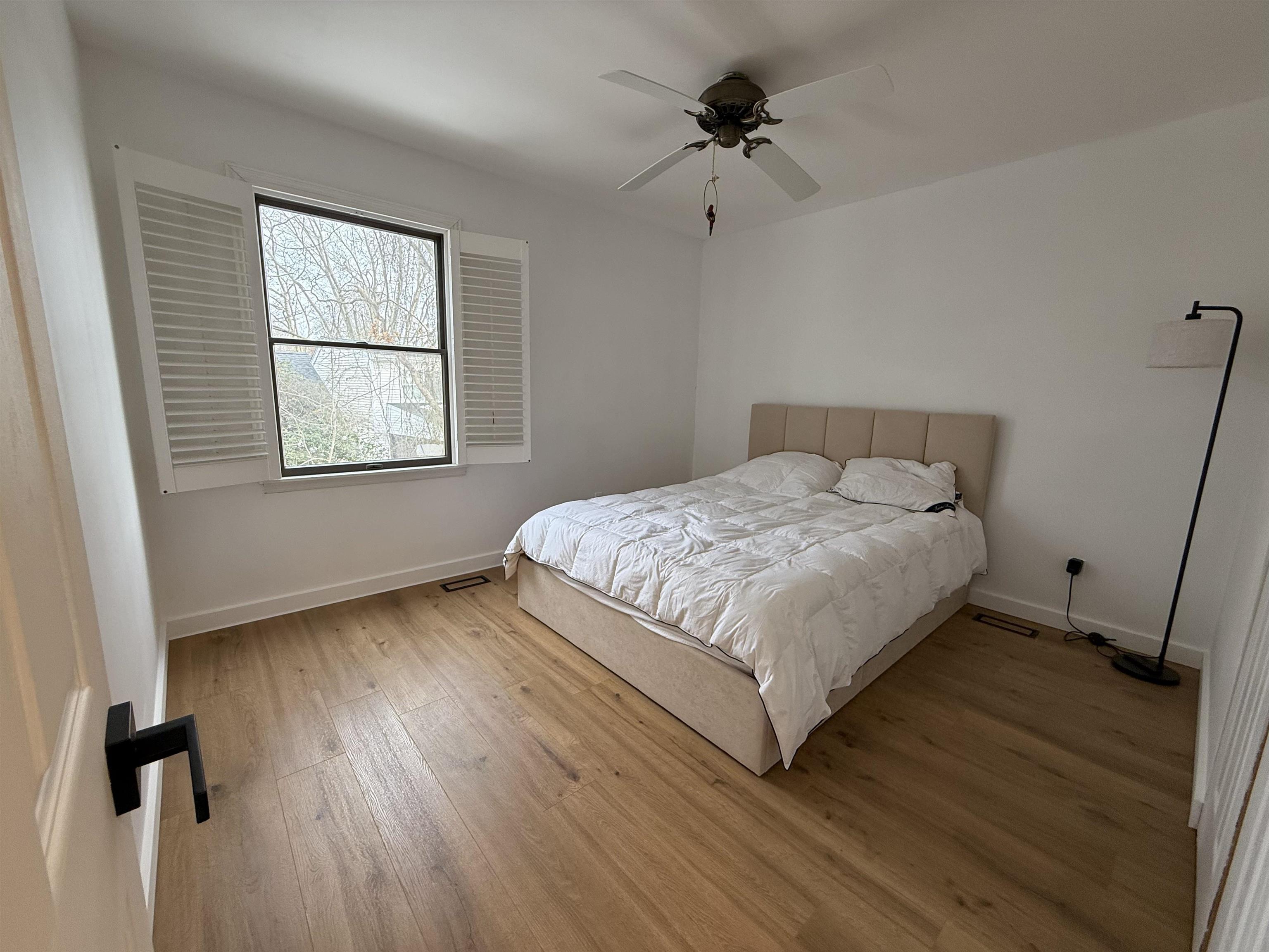 510 Portsmouth Road Cape May, NJ 08204 - Photo 9 of 18 a bedroom with a bed and window