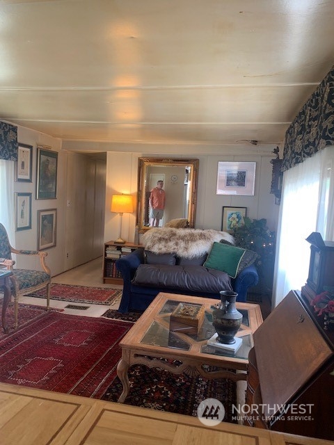 23708 Locust Way, Unit 45 Bothell, WA 98021 - Photo 4 of 13 a living room with furniture and a fireplace