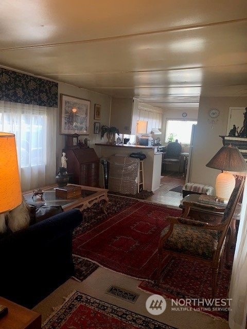 23708 Locust Way, Unit 45 Bothell, WA 98021 - Photo 10 of 13 a room with furniture pool table and window