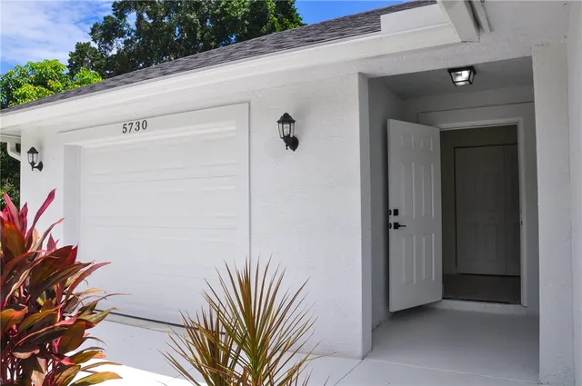 a view of a back yard of the house
