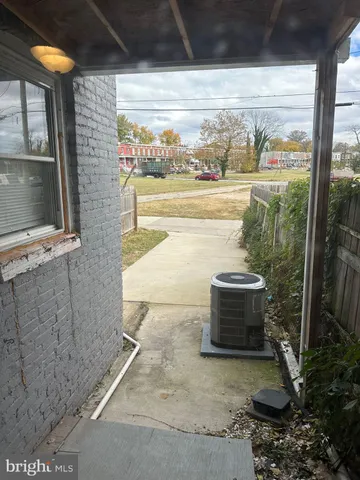 a view of a two door of the house with outdoor space