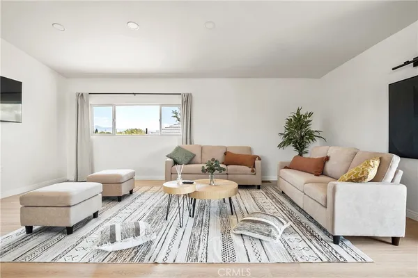 a living room with furniture and a couch