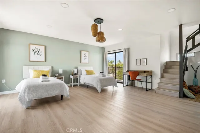 a bedroom with bed and window