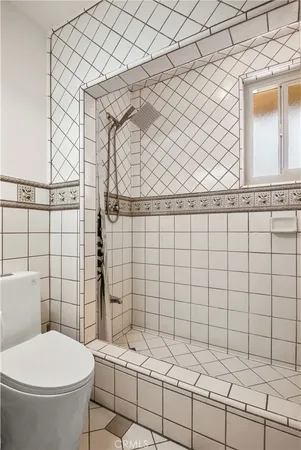 a bathroom with a sink and toilet