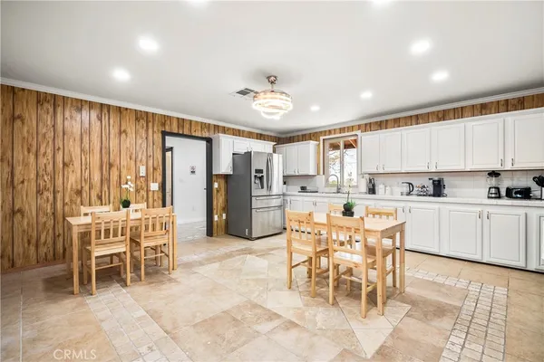 a view of a dining room kitchen and a window