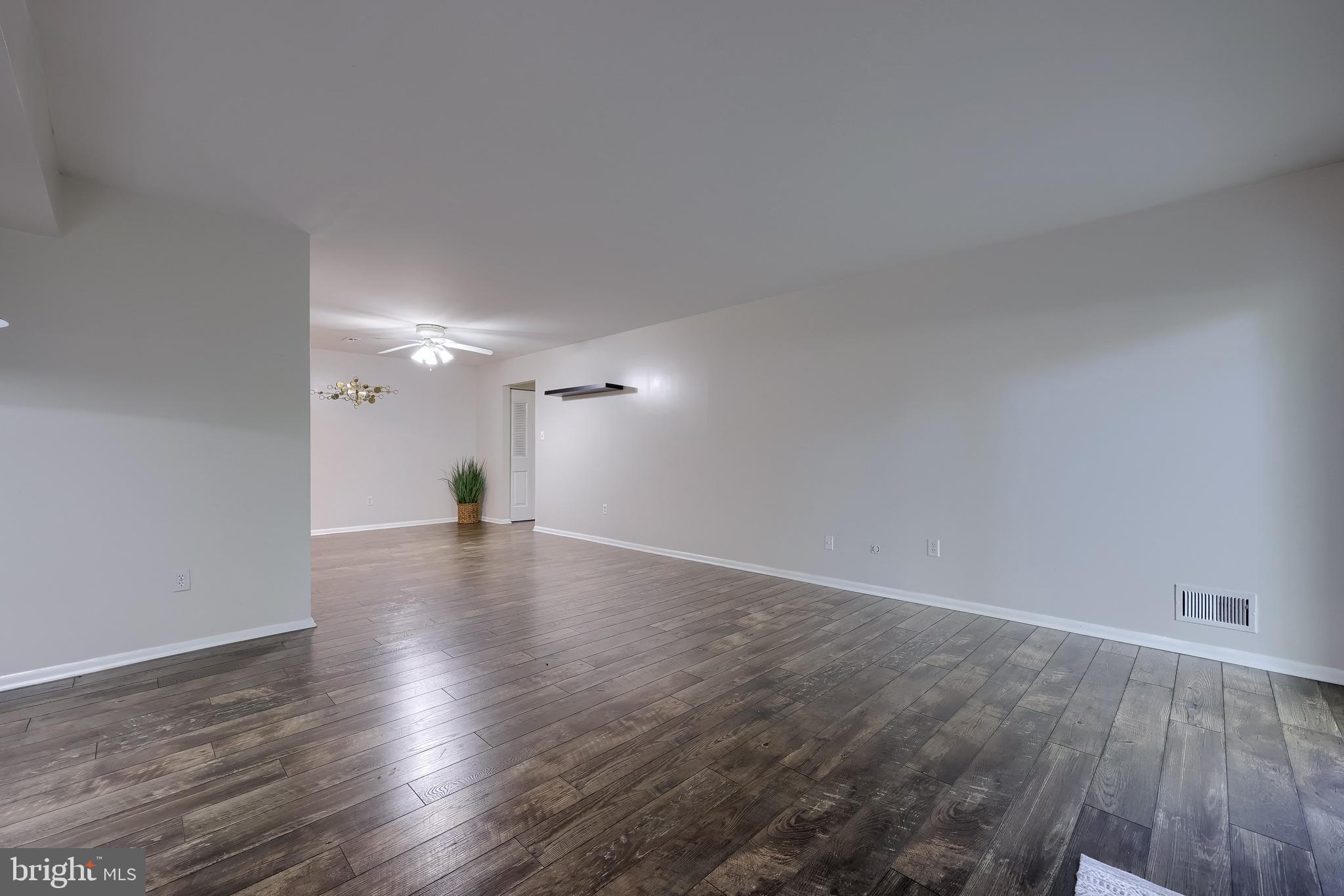 2900 State Hill Road, Unit I5 Reading, PA 19610 - Photo 7 of 26 a view of a room with wooden floor and staircase