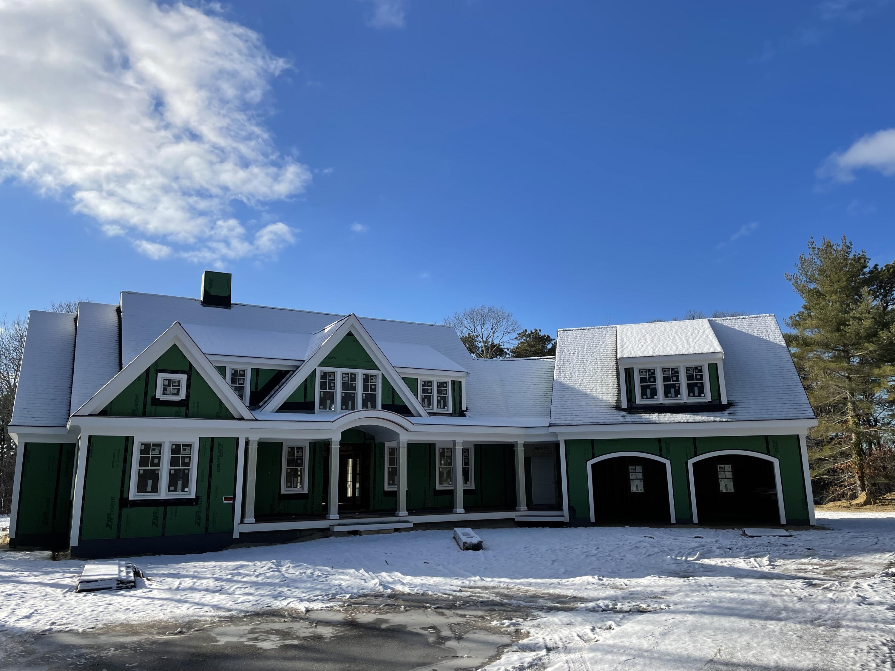 51 Paddocks Path Dennis, MA 02638 - Photo 2 of 12 a front view of a house