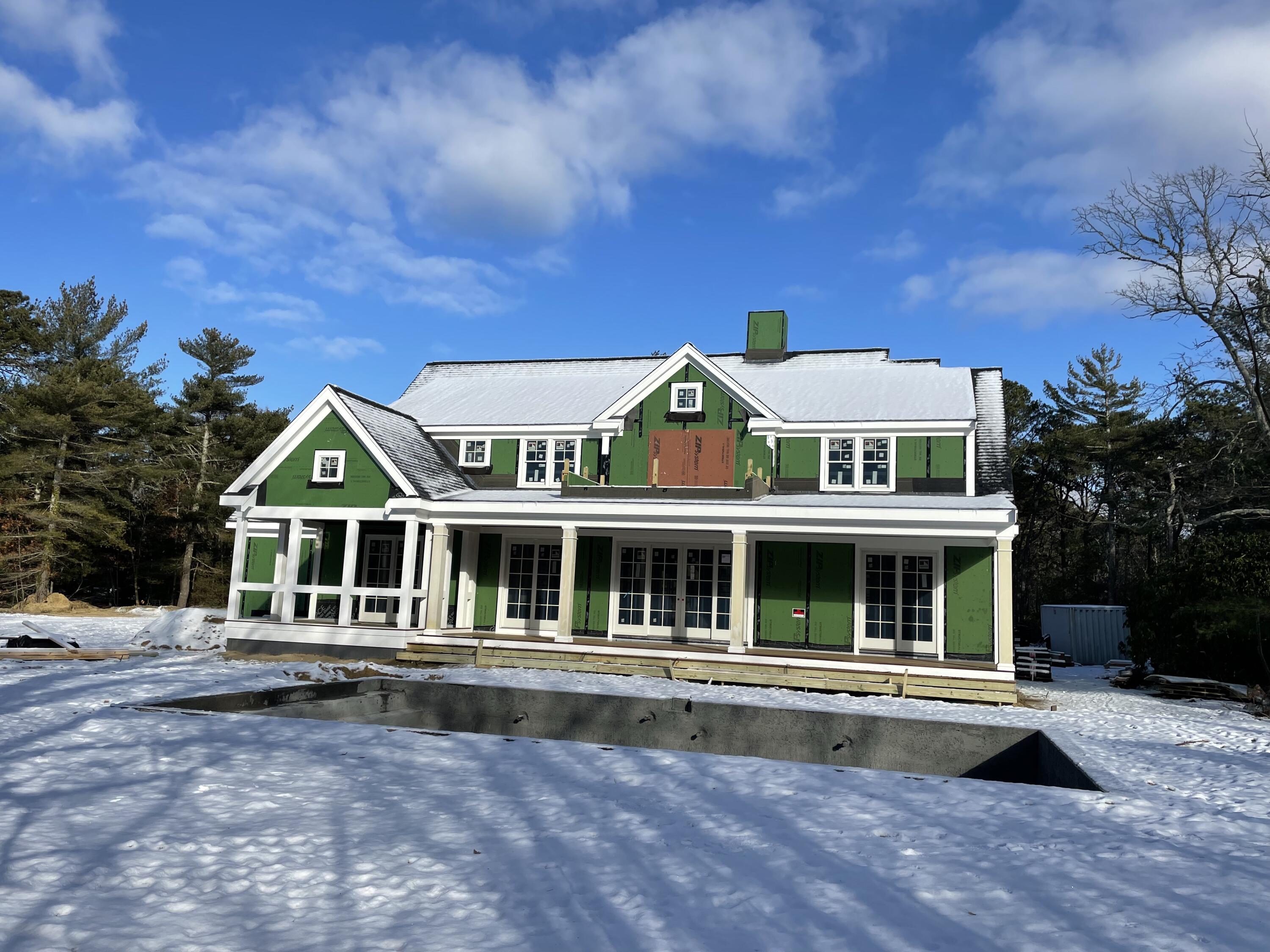 51 Paddocks Path Dennis, MA 02638 - Photo 3 of 12 a view of a house with a swimming pool