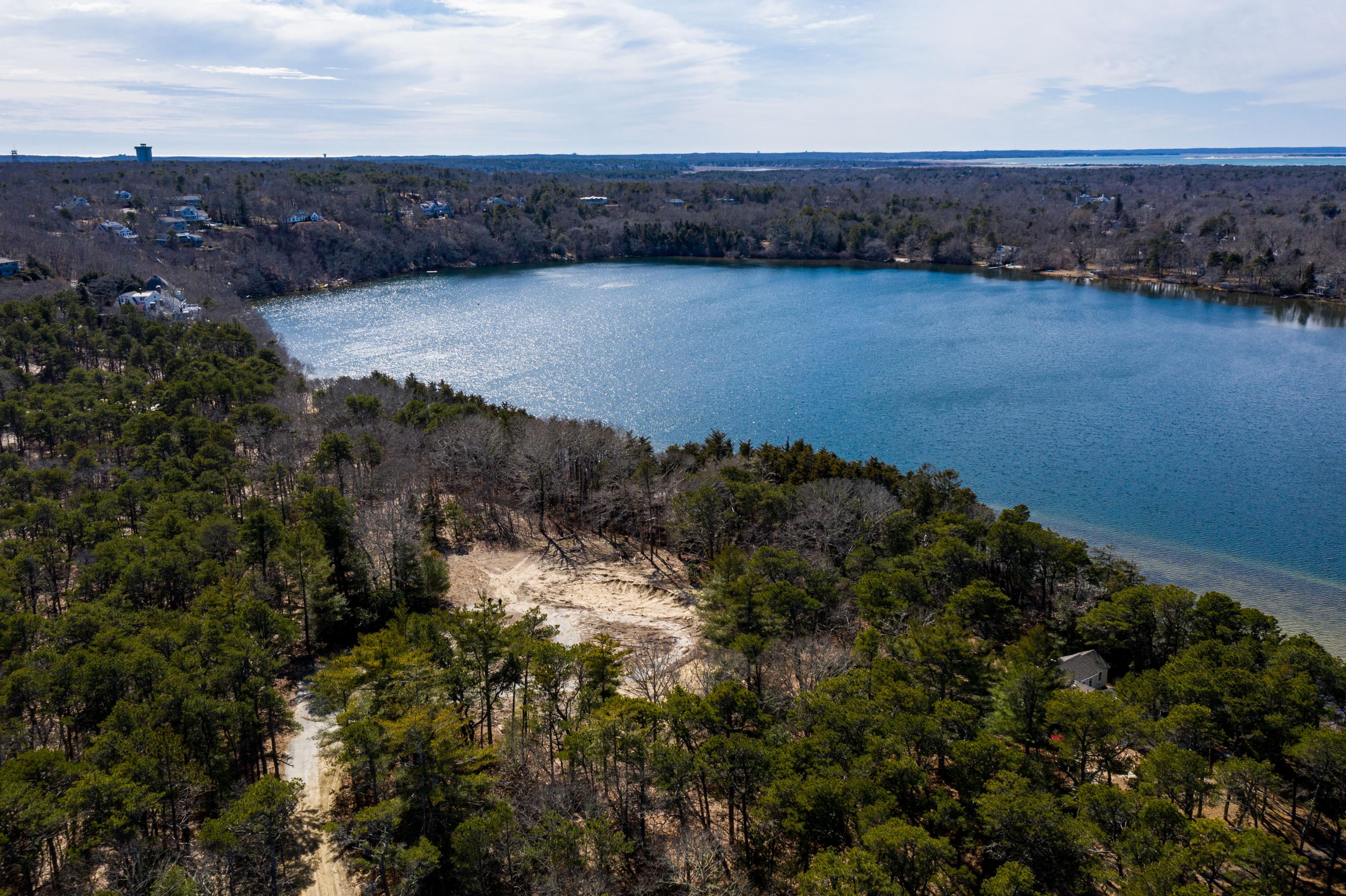 51 Paddocks Path Dennis, MA 02638 - Photo 5 of 12 a view of lake and mountain