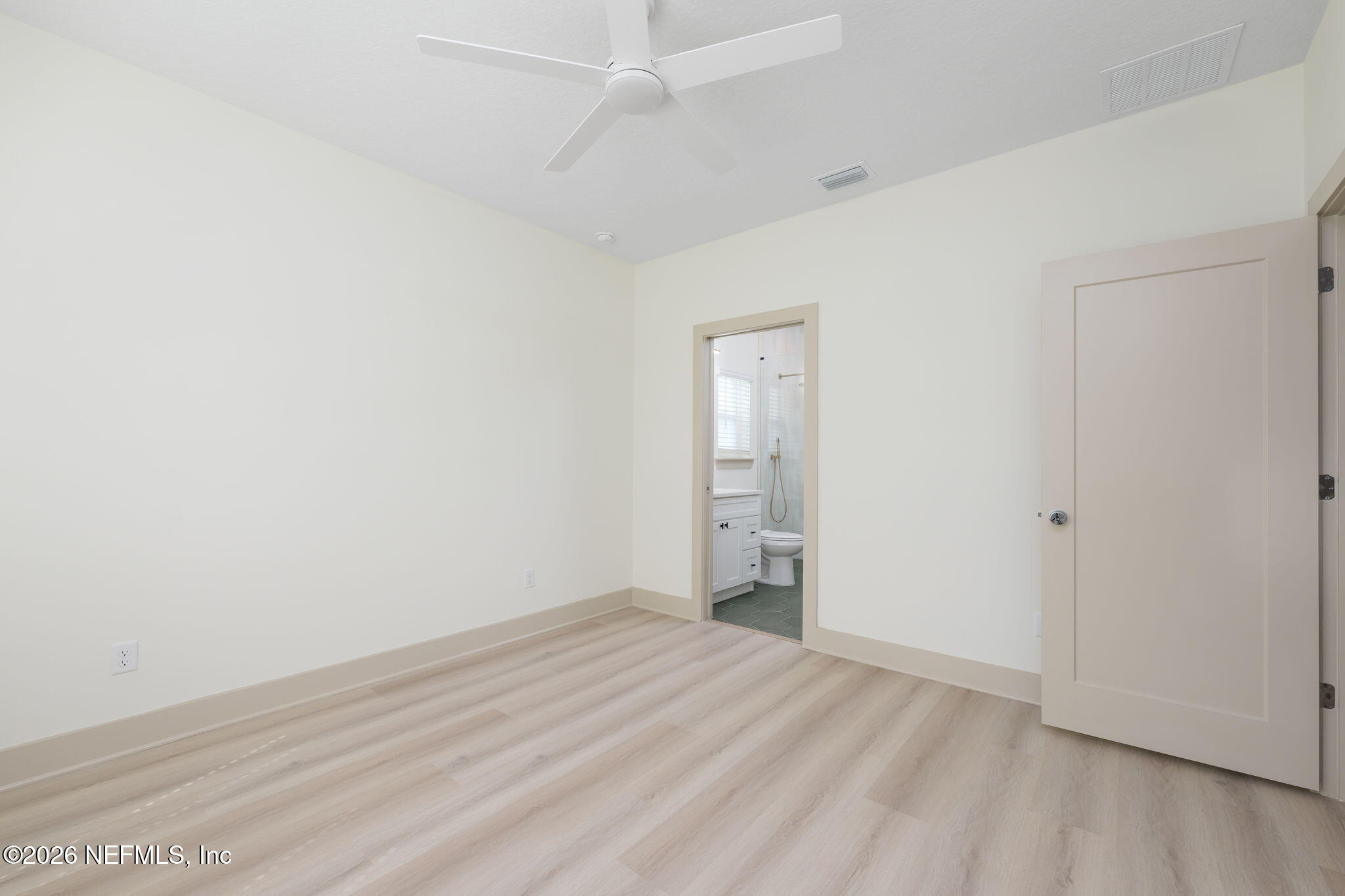716 West 6th Street St. Augustine, FL 32084 - Photo 14 of 28 a view of empty room with wooden floor