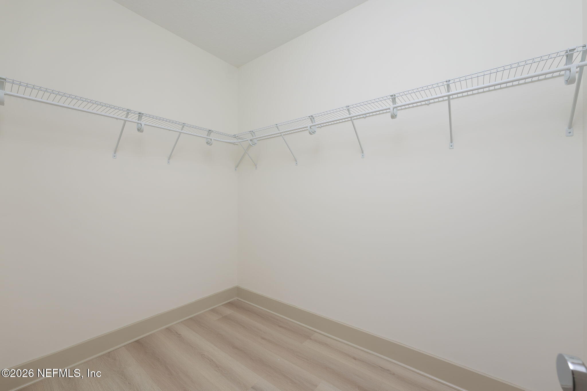 716 West 6th Street St. Augustine, FL 32084 - Photo 17 of 28 a view of a room with racks on the wall