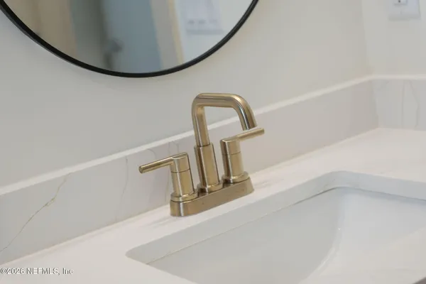 a close view of a faucet in a bathtub
