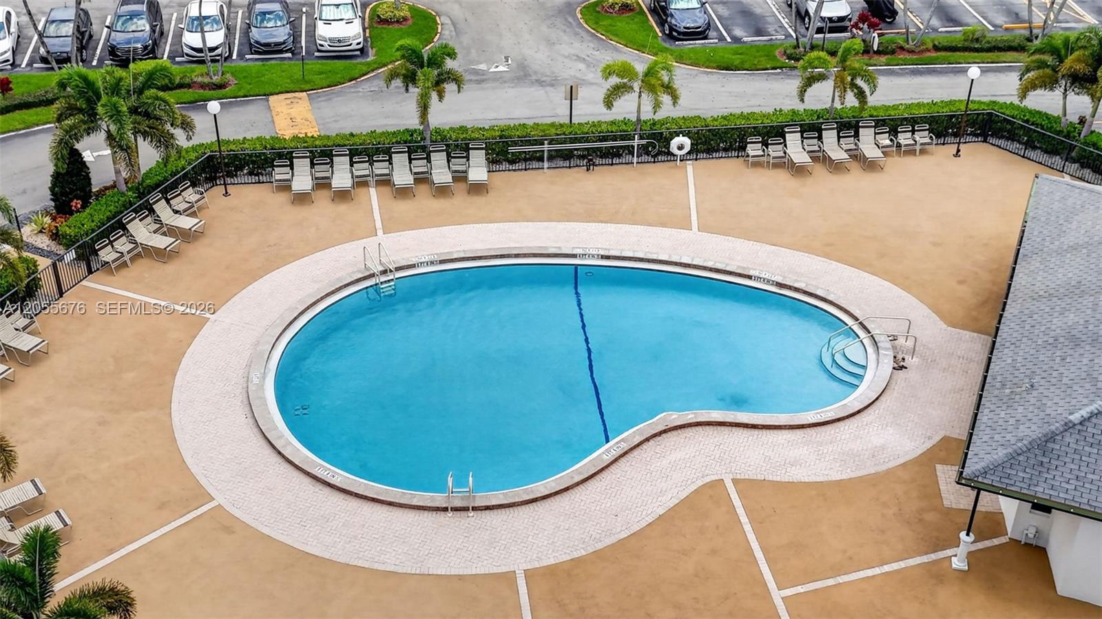 3052 Guilford C, Unit 3052 Boca Raton, FL 33434 - Photo 52 of 107 Pool just steps away from buiding.