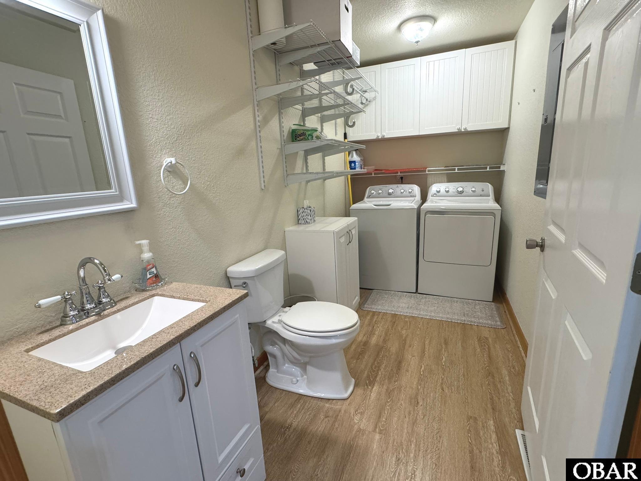 113 Sir Walter Raleigh Drive Kill Devil Hills, NC 27948 - Photo 22 of 43 Laundry and half bath