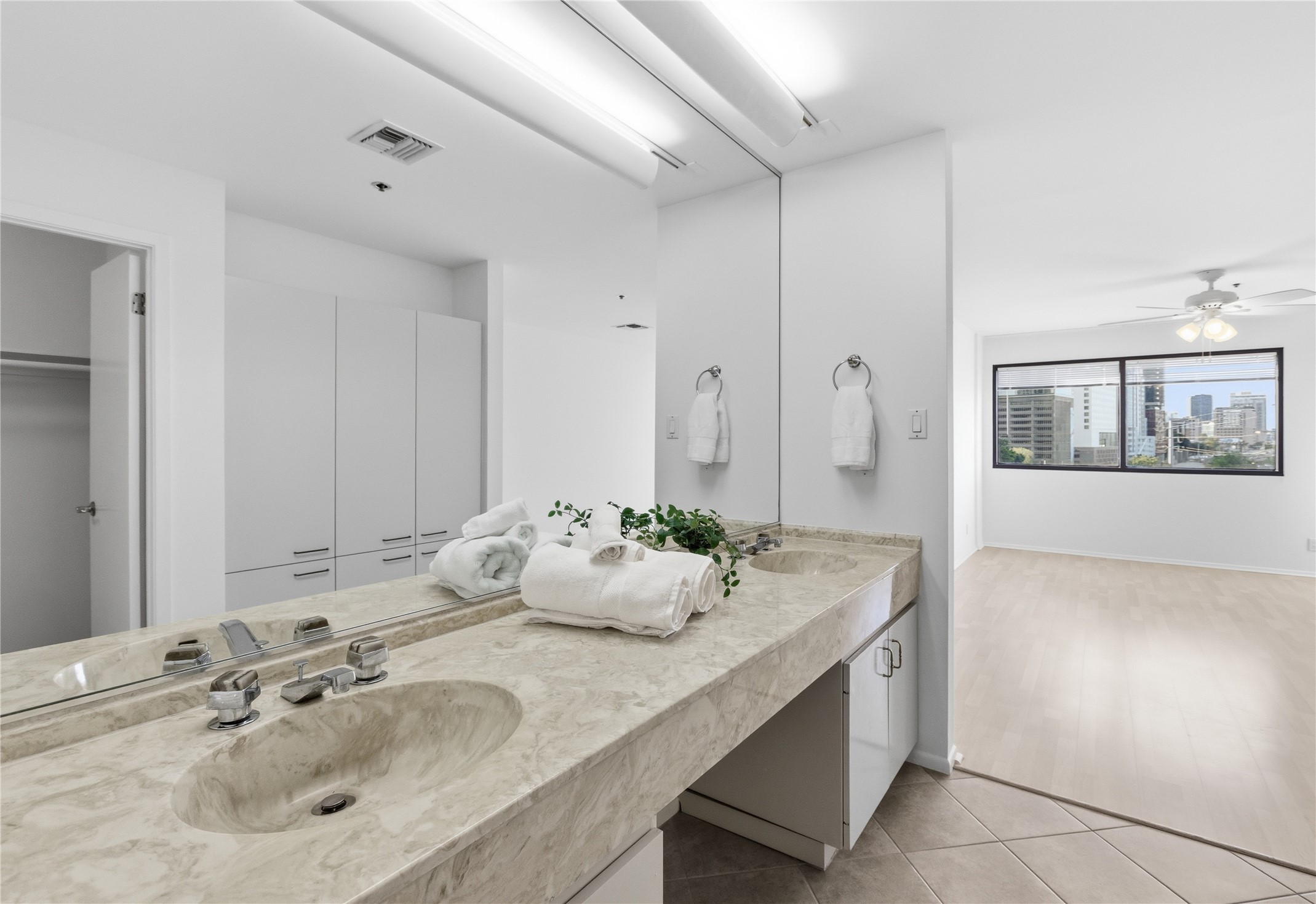 40 North Interstate Highway 35, Unit 7B1 Austin, TX 78701 - Photo 10 of 21 A sleek vanity with double sinks, generous counter space, and ample storage.
