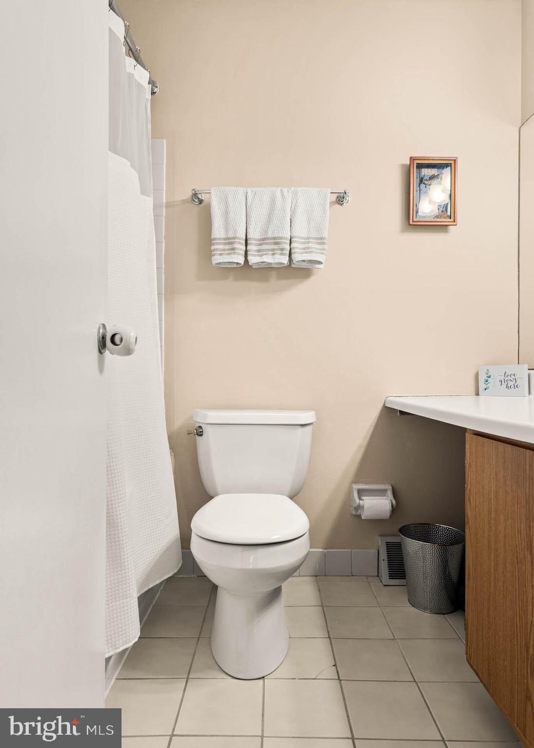 2201 Aspen Circle Springfield, PA 19064 - Photo 17 of 18 a bathroom with a toilet and a sink