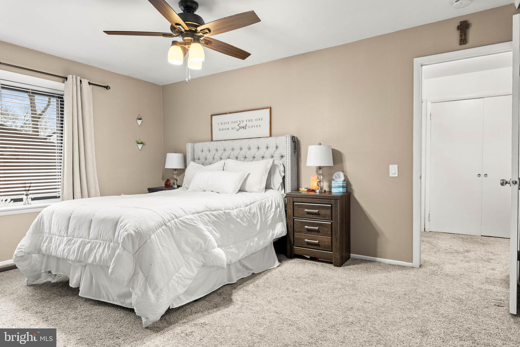 2201 Aspen Circle Springfield, PA 19064 - Photo 9 of 18 a bedroom with a bed and a ceiling fan