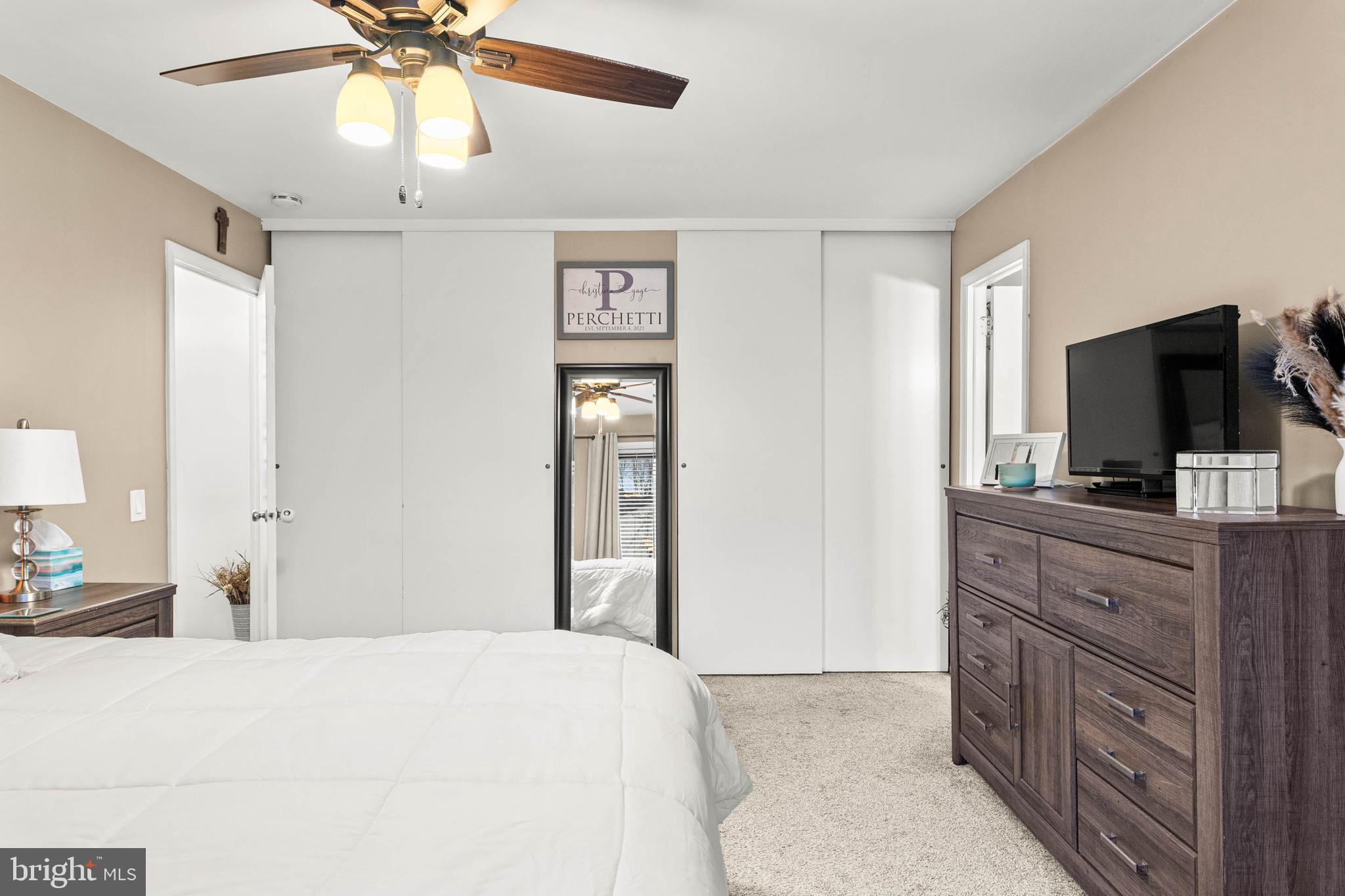 2201 Aspen Circle Springfield, PA 19064 - Photo 10 of 18 a bedroom with a bed and a flat screen tv