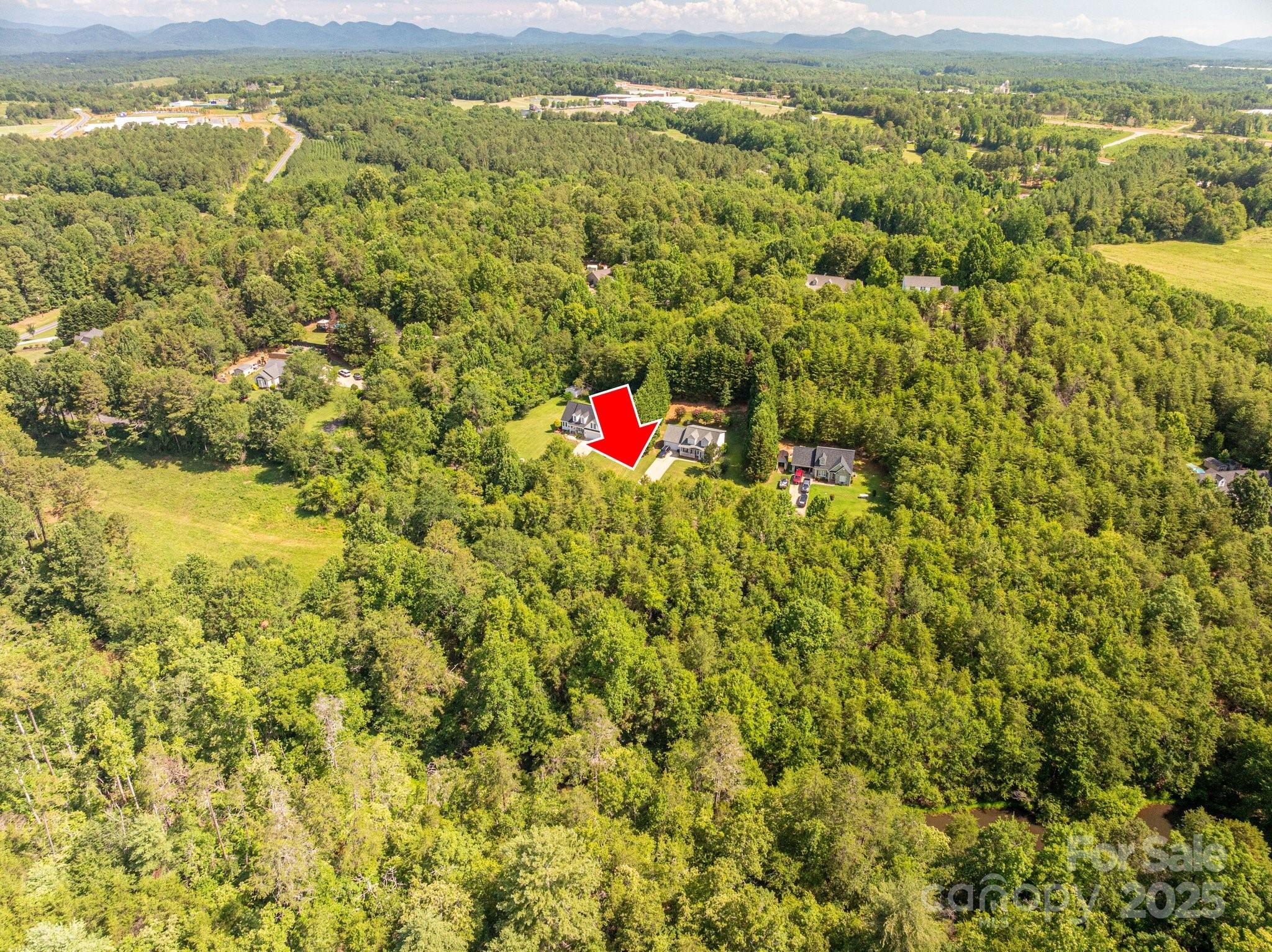 Lot 7 Meadow Crossing Drive Rutherfordton, NC 28139 - Photo 11 of 15 a view of a city with mountains in the background