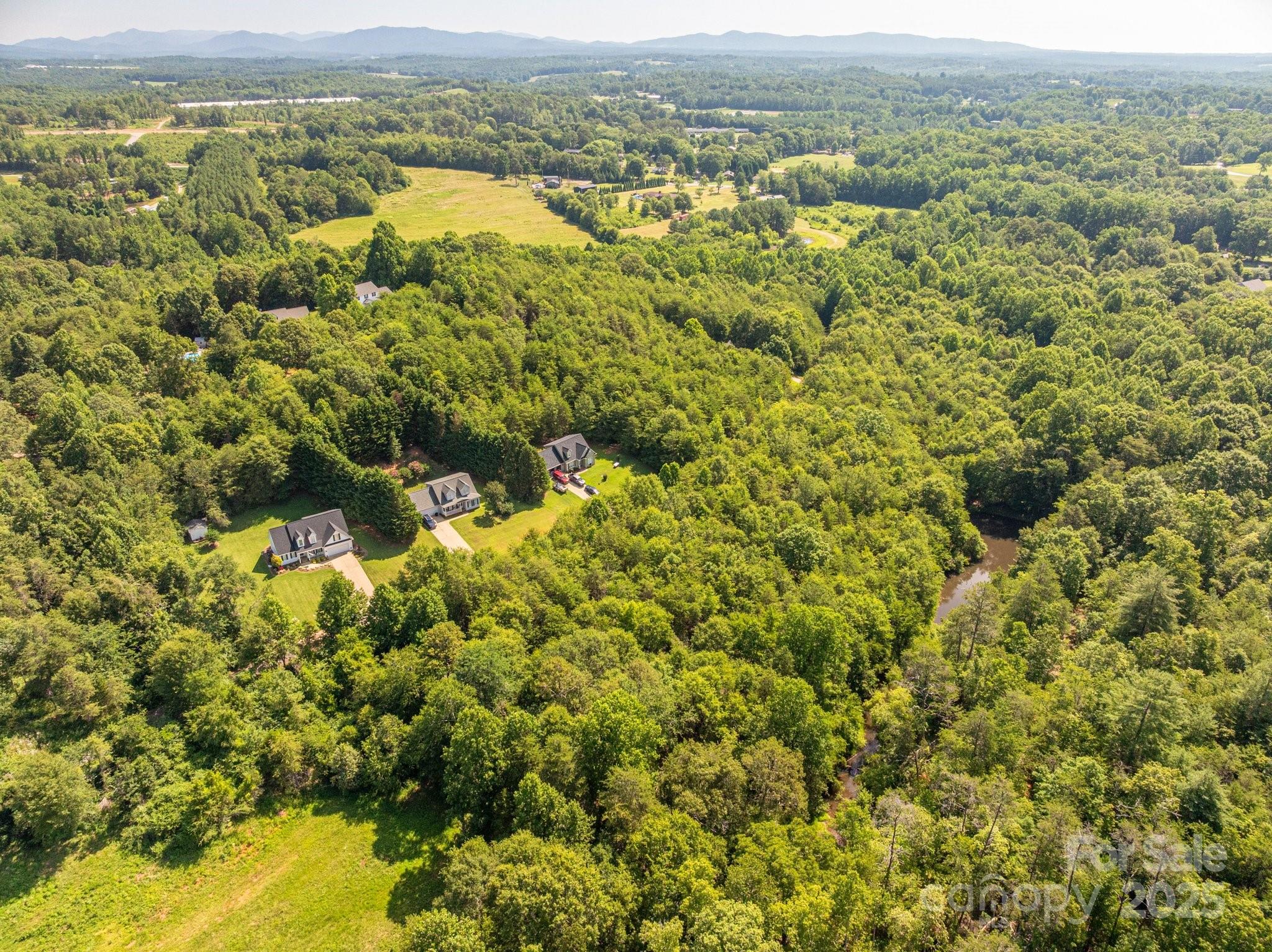 Lot 7 Meadow Crossing Drive Rutherfordton, NC 28139 - Photo 7 of 15 a view of a city with an ocean