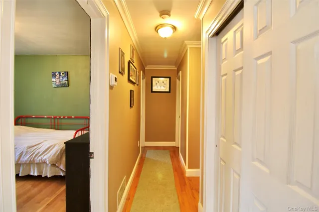 a bathroom with a tub shower and sink