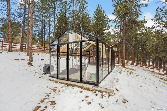 a view of snow on the road