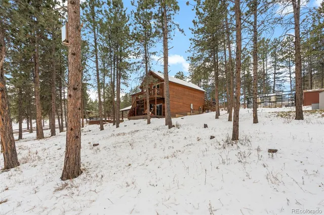 a view of snow on the road