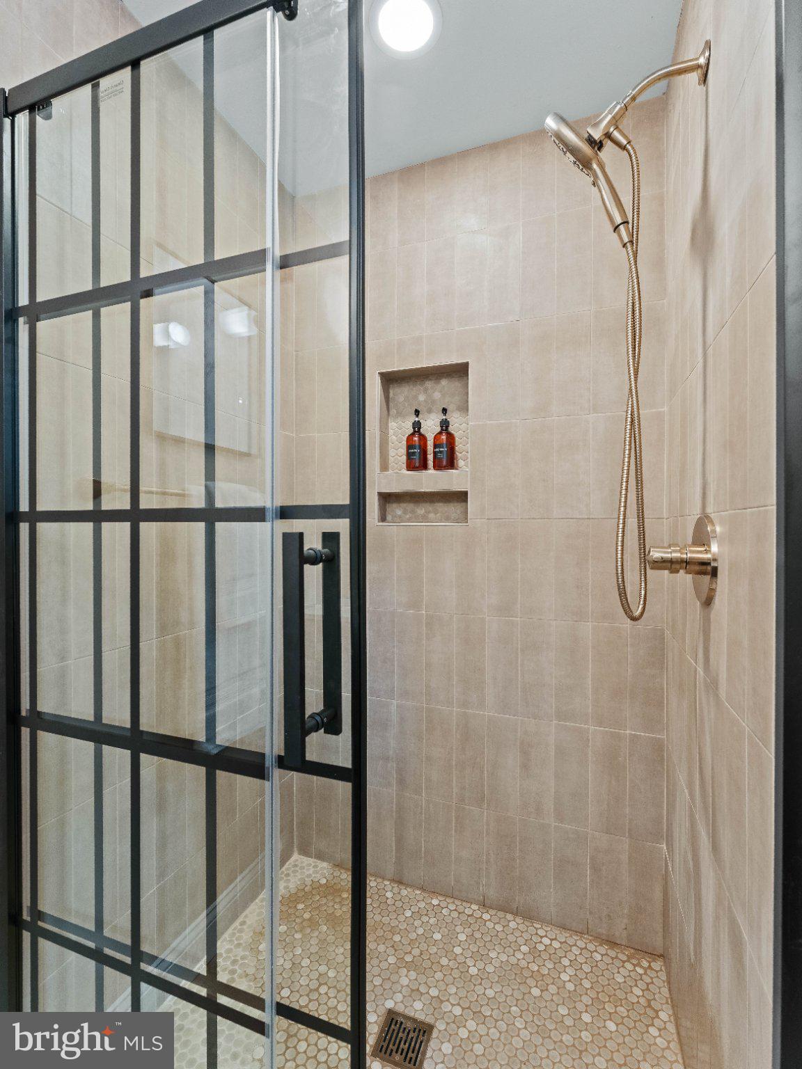 406 Yorkshire Road Cherry Hill, NJ 08034 - Photo 16 of 46 Sleek modern shower with elegant finishes.