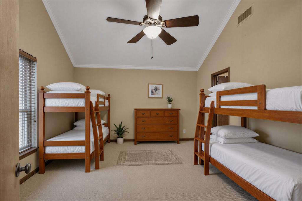 504 Moore Road Elm Grove, LA 71051 - Photo 15 of 37 Bedroom 2 shown virtually staged with bunk beds to accomodate more sleepers.