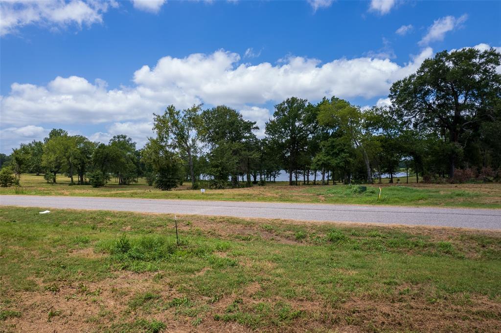 Lot 3-tbd Lot 3-tbd Carolina Way Mount Mount Pleasant, TX 75455 - Photo 11 of 13 a view of swimming pool with outdoor space and trees in the background