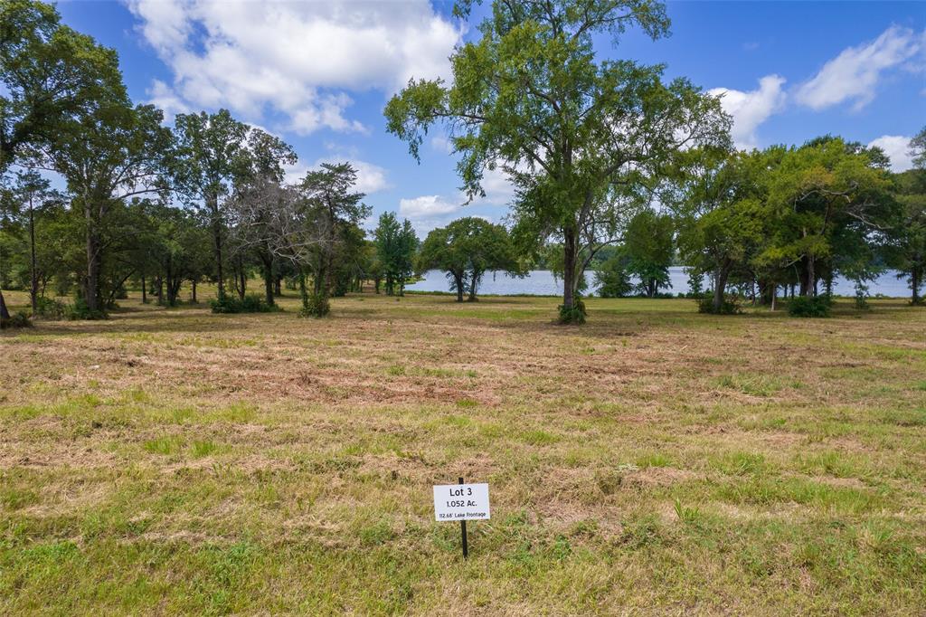 Lot 3-tbd Lot 3-tbd Carolina Way Mount Mount Pleasant, TX 75455 - Photo 3 of 13 a backyard of a house with lots of green space