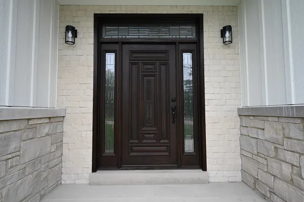 a large kitchen with stainless steel appliances granite countertop a stove and a refrigerator