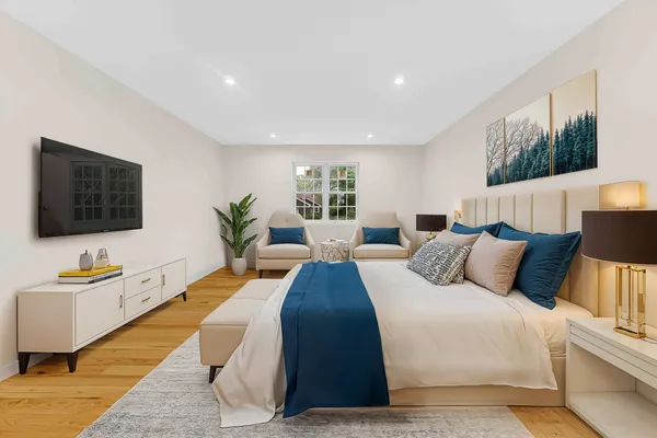 a view of room with wooden floor