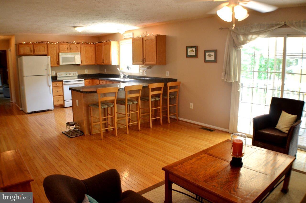 25101 Woodmark Way Chaptico, MD 20621 - Photo 7 of 30 Kitchen/Living Room