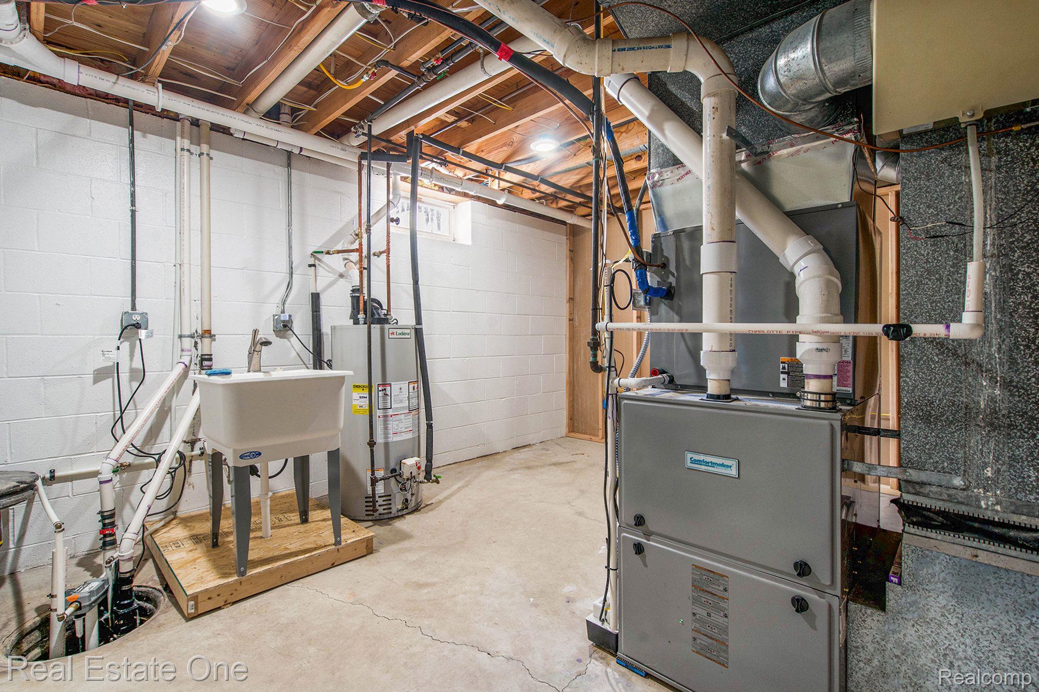 27375 Romine Road New Boston, MI 48164 - Photo 33 of 60 Another laundry area, sump pump & furnace