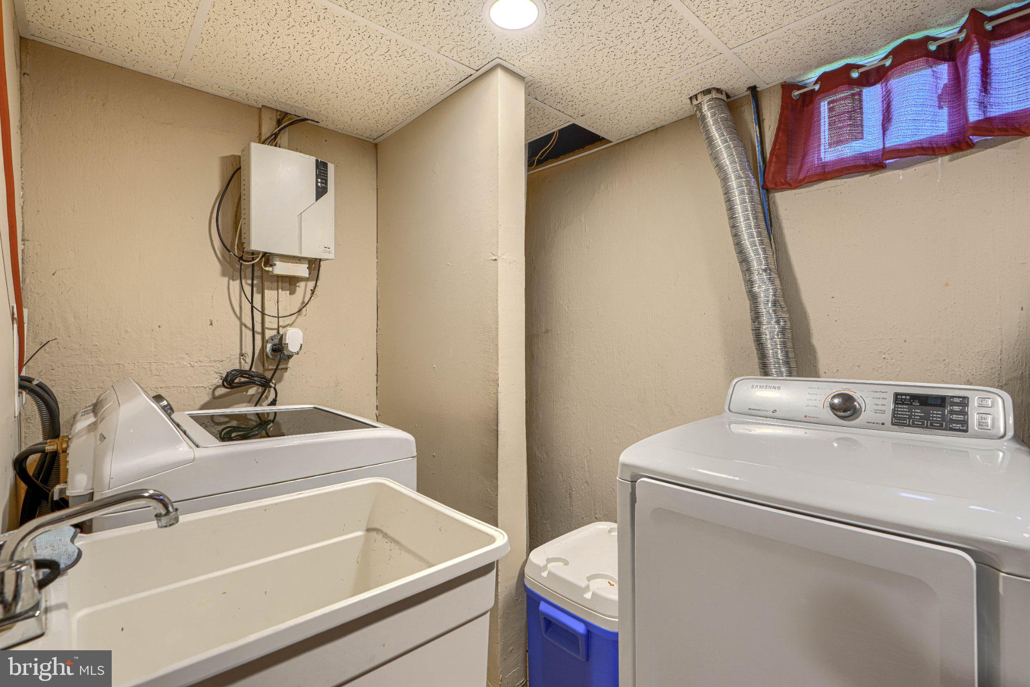 3708 Cassen Road Randallstown, MD 21133 - Photo 34 of 38 a bathroom with a sink and a mirror