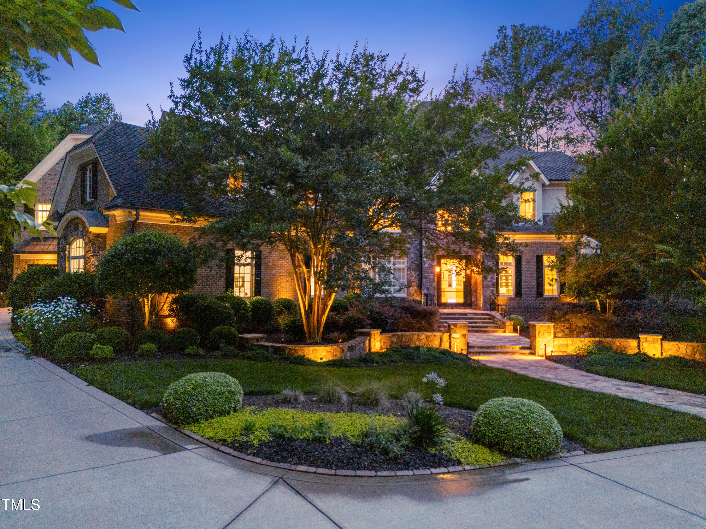 11205 Jonas Ridge Lane Raleigh, NC 27613 - Photo 3 of 3 a front view of a house with a yard